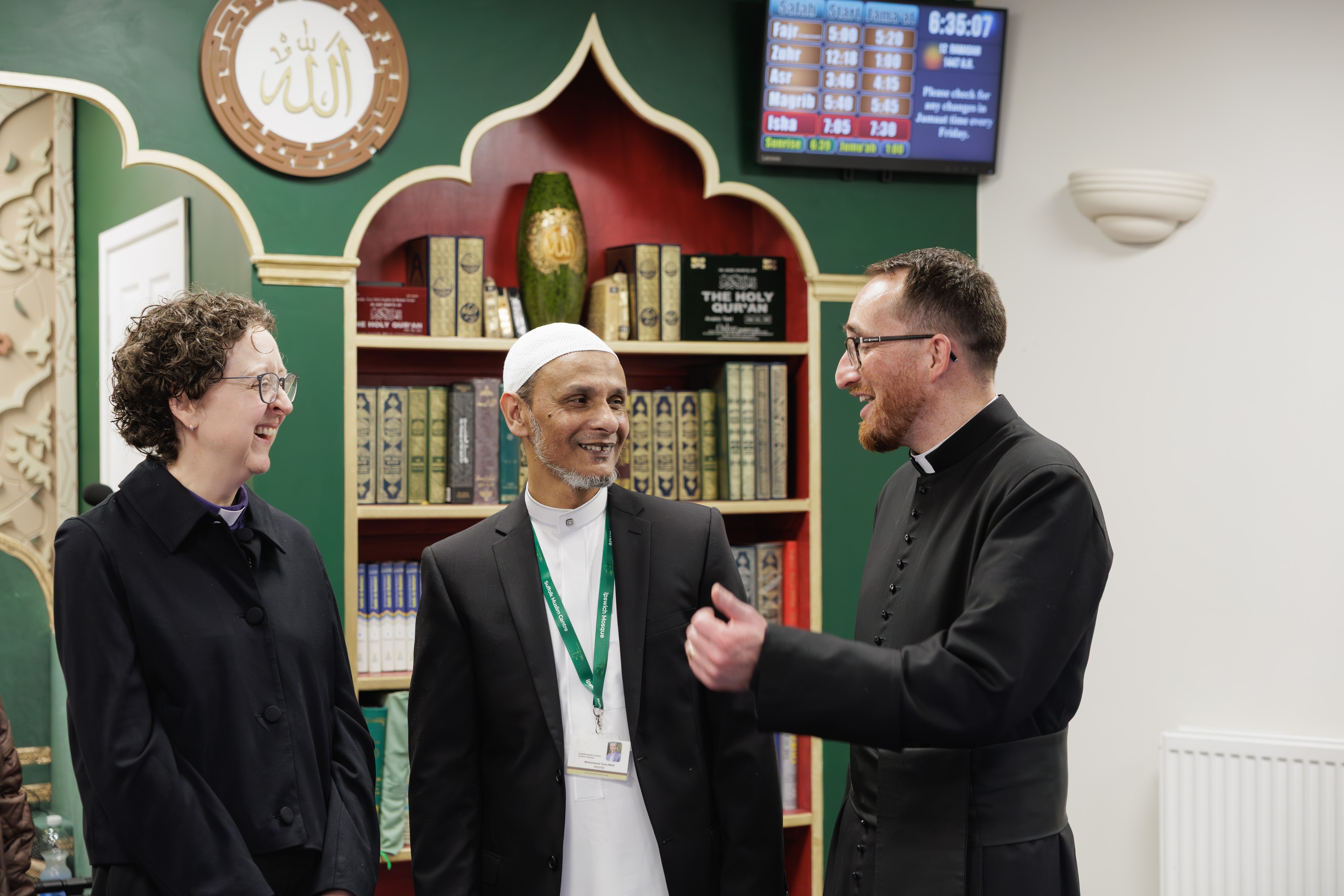 Bishop Joanne, Tom Mumford stood in Mosque with Mohammed Tunu Miah