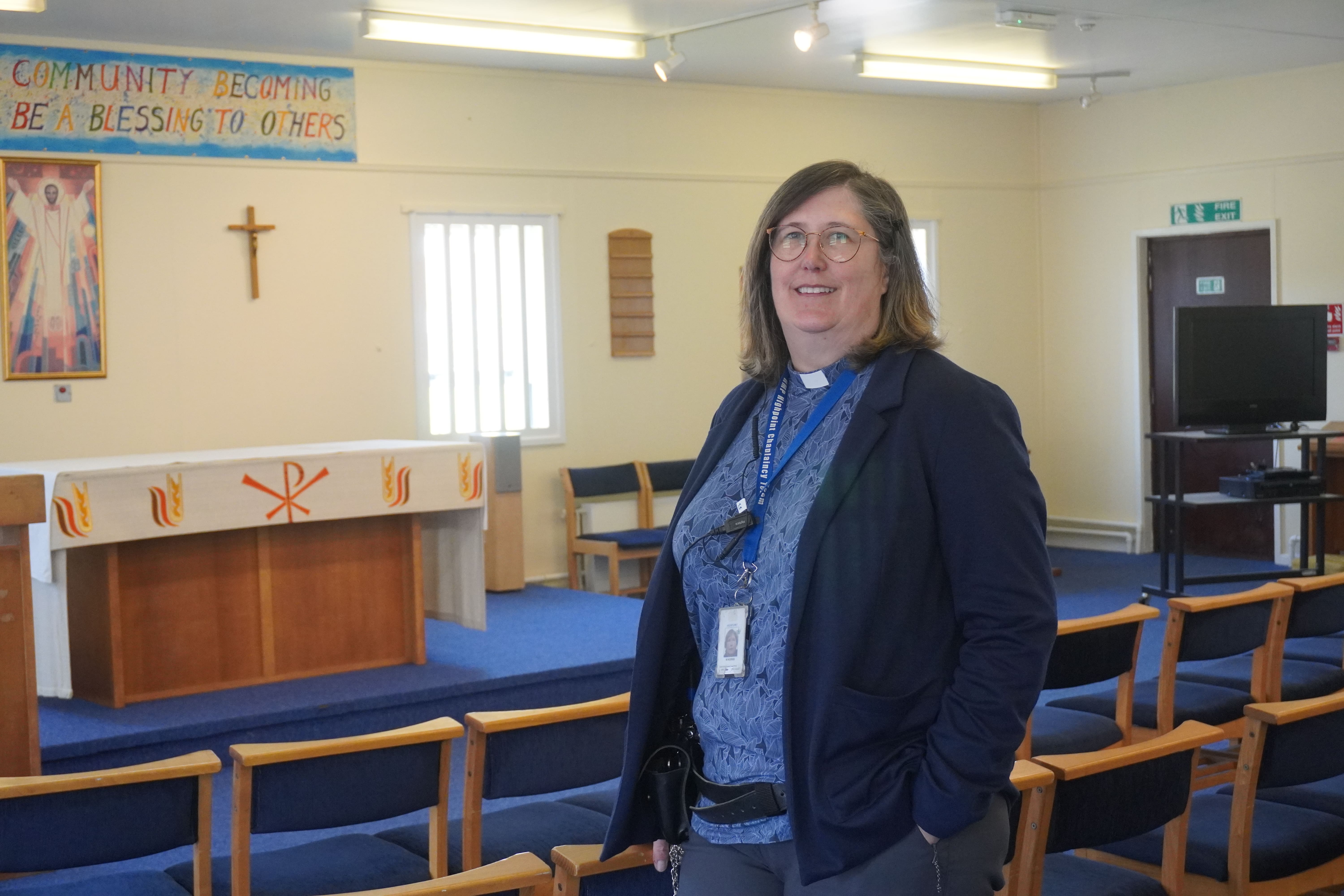 Prison Chaplain standing in a faith room