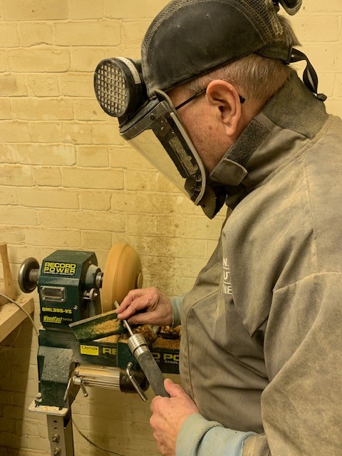 Bishop Martin working the lathe